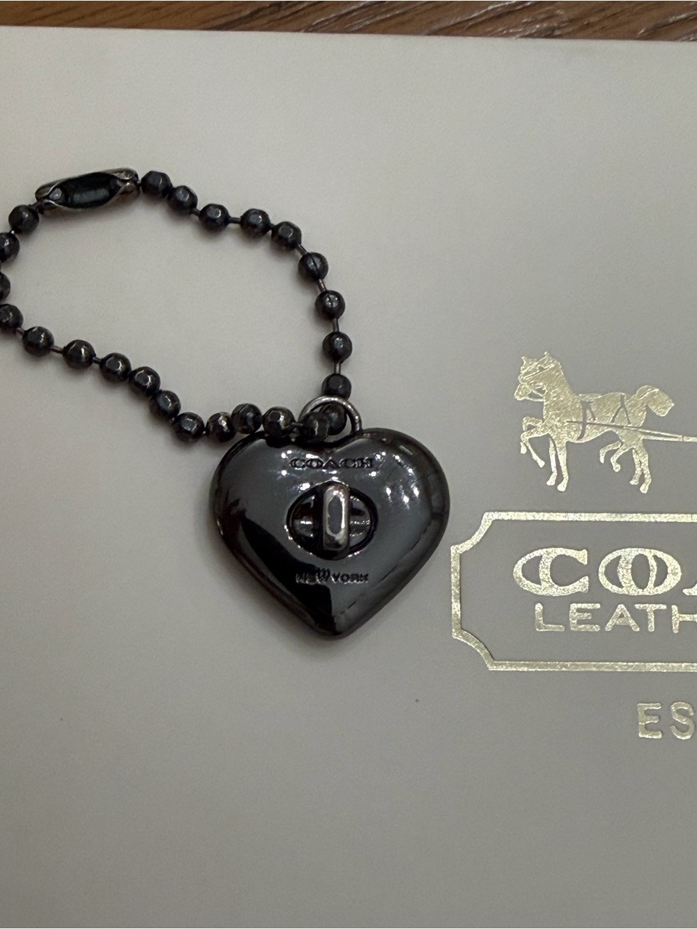 Coach Black Turn-lock Heart Hang Tag Charm